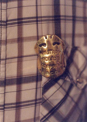 William Brand wearing the BG-45.1 vest badge
